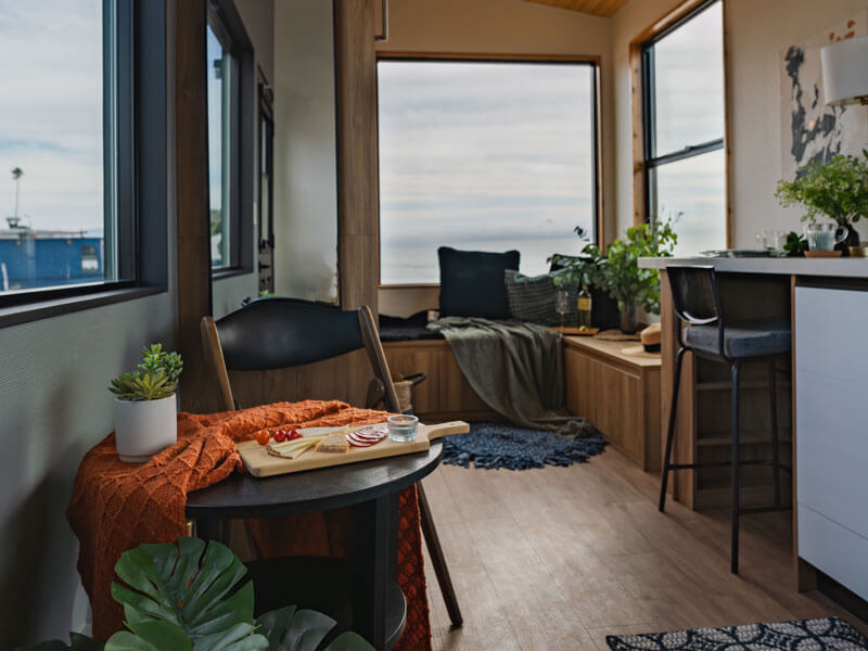 cozy tiny home living room overlooking ocean
